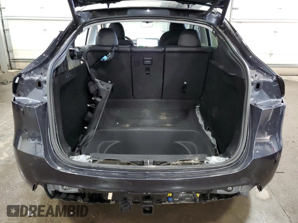 2024 Tesla Model Y Long Range with VIN 7SAYGDEE6RA253946, listed as a Copart auction lot 46699445 with 6,008 mi miles and Salvage Title. Bid and sale history available at DreamBid. Image 6.