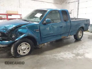 2000 Ford F-150 XL z VIN 1FTRX18L7YKB27657, wystawiony jako IAAI lot #42262373 z przebiegiem Nie podano mil oraz . Historia ofert i sprzedaży dostępna na DreamBid. Obrazek 6.