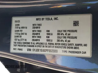 2023 Tesla Model 3 with VIN 5YJ3E1EAXPF652089, listed as a IAAI auction lot 42666520 with 17,679 mi miles and . Bid and sale history available at DreamBid. Image 9.