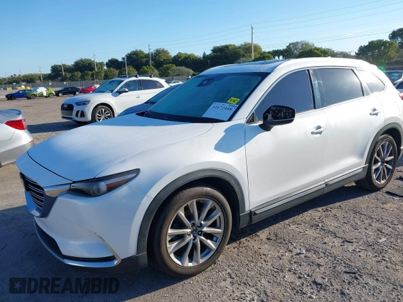 2019 Mazda CX-9 Grand Touring with VIN JM3TCADY3K0305173, listed as a IAAI auction lot 41672448 with 132,265 mi miles. Bid and sale history available at carsss.com. Image 17.