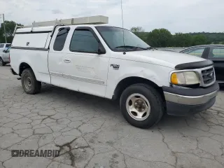 2000 Ford F-150 XL with VIN 1FTRX17W6YNA22330, listed as a Copart auction lot 55559795 with Not provided miles and Salvage title. Bid and sale history available at DreamBid. Image 4.