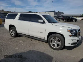 2015 Chevrolet Suburban LT with VIN 1GNSKJKC4FR691285, listed as a Copart auction lot 53137615 with 225,415 mi miles and Salvage Title. Bid and sale history available at DreamBid. Image 4.
