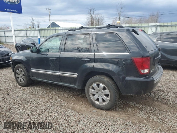 2009 Jeep Grand Cherokee Limited with VIN 1J8HR58T99C537829, listed as a Copart auction lot 54052545 with 256,855 mi miles and Clean title. Bid and sale history available at DreamBid. Image 2.