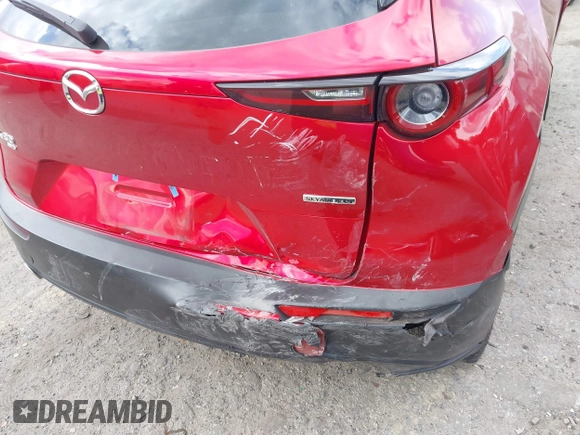2024 Mazda CX-30 S Carbon Edition with VIN 3MVDMBCM6RM627083, listed as a IAAI auction lot 41715241 with 23,855 mi miles and . Bid and sale history available at DreamBid. Image 6.