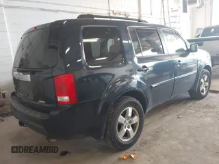 2009 Honda Pilot EX-L with VIN 5FNYF48509B036410, listed as a IAAI auction lot 41859708 with 216,558 mi miles. Bid and sale history available at carsss.com. Image 4.