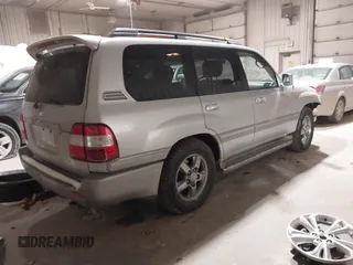 2007 Toyota Land Cruiser z VIN JTEHT05J972108283, wystawiony jako IAAI lot #41476536 z przebiegiem 212 693 mil mil oraz . Historia ofert i sprzedaży dostępna na DreamBid. Obrazek 4.