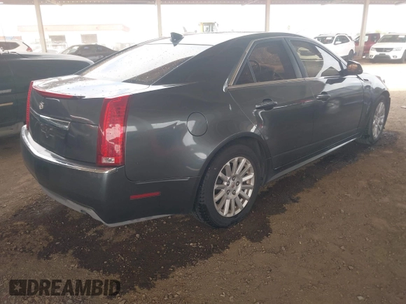 2011 Cadillac CTS Luxury with VIN 1G6DF5EY6B0104932, listed as a IAAI auction lot 42032457 with 165,833 mi miles and . Bid and sale history available at DreamBid. Image 4.