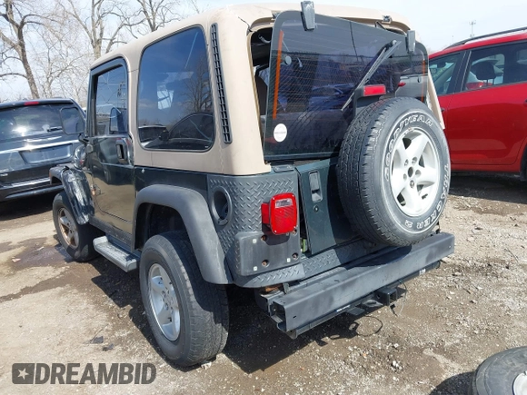 2002 Jeep Wrangler Sport with VIN 1J4FA49S62P743771, listed as a IAAI auction lot 41791205 with 186,622 mi miles. Bid and sale history available at carsss.com. Image 3.