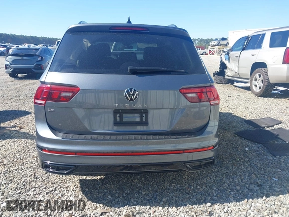 2024 Volkswagen Tiguan SE R-Line Black with VIN 3VVCB7AX2RM114556, listed as a IAAI auction lot 41887373 with 7,013 mi miles and . Bid and sale history available at DreamBid. Image 16.