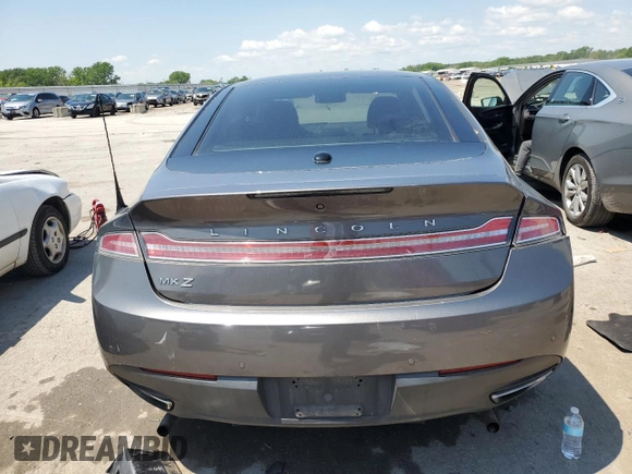 2014 Lincoln MKZ Hybrid z VIN 3LN6L2LU3ER806204, wystawiony jako Copart lot #56291185 z przebiegiem 258 082 mil mil oraz Szkoda całkowita • Salvage title. Historia ofert i sprzedaży dostępna na DreamBid. Obrazek 6.