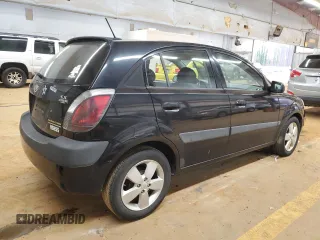 2009 Kia Rio LX with VIN KNADE243896580883, listed as a Copart auction lot 43735505 with 135,726 mi miles and Salvage Title. Bid and sale history available at carsss.com. Image 3.