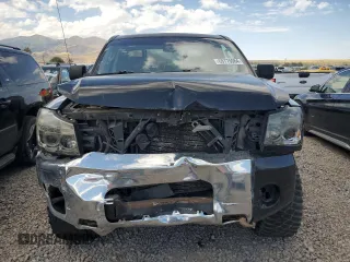 2010 Nissan Titan XE with VIN 1N6BA0EJ5AN318639, listed as a Copart auction lot 69776984 with 158,913 mi miles and Salvage Title. Bid and sale history available at carsss.com. Image 5.
