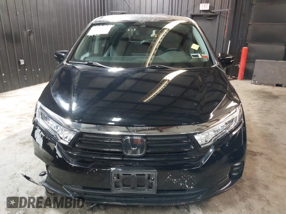 2021 Honda Odyssey Touring with VIN 5FNRL6H83MB040138, listed as a IAAI auction lot 39150096 with 61,322 mi miles and . Bid and sale history available at DreamBid. Image 12.