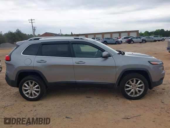 2015 Jeep Cherokee Limited with VIN 1C4PJMDS3FW706058, listed as a IAAI auction lot 41951302 with 163,404 mi miles. Bid and sale history available at carsss.com. Image 13.