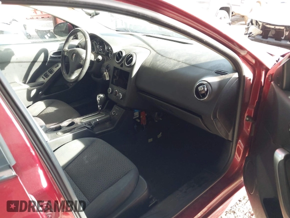2009 Pontiac G6 1SB with VIN 1G2ZJ57KX94259078, listed as a IAAI auction lot 41223904 with 129,681 mi miles and . Bid and sale history available at DreamBid. Image 5.