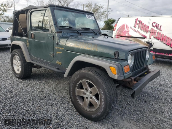 2002 Jeep Wrangler Sport with VIN 1J4FA49SX2P726553, listed as a Copart auction lot 42559245 with 198,584 mi miles and Clean Title. Bid and sale history available at carsss.com. Image 4.