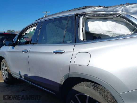 2019 Honda Pilot Touring 7-Passenger with VIN 5FNYF6H60KB038846, listed as a IAAI auction lot 41339385 with Not provided miles and . Bid and sale history available at DreamBid. Image 14.