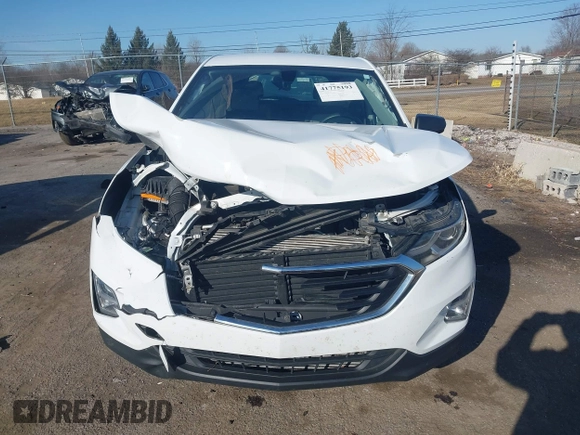 2018 Chevrolet Equinox LS with VIN 2GNAXHEV5J6110013, listed as a IAAI auction lot 41775193 with 113,938 mi miles and . Bid and sale history available at DreamBid. Image 12.