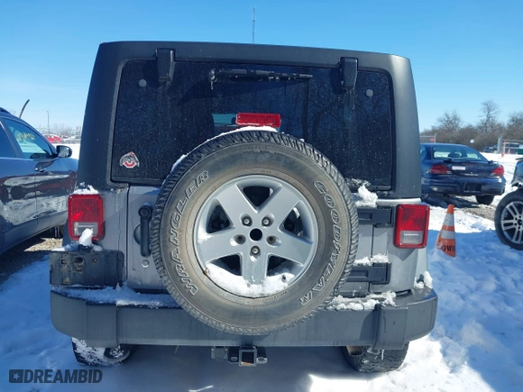 2013 Jeep Wrangler Unlimited Sport with VIN 1C4BJWDGXDL651995, listed as a IAAI auction lot 41578040 with 114,698 mi miles. Bid and sale history available at carsss.com. Image 16.