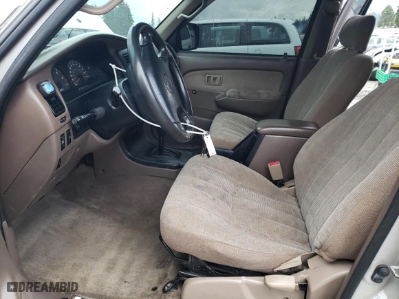 2000 Toyota 4Runner with VIN JT3GM84RXY0056635, listed as a Copart auction lot 43982165 with 183,534 mi miles and Salvage Title. Bid and sale history available at carsss.com. Image 7.