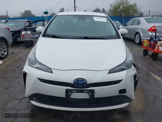 2021 Toyota Prius L Eco with VIN JTDKAMFU6M3141019, listed as a IAAI auction lot 41821212 with 202,756 mi miles. Bid and sale history available at carsss.com. Image 12.
