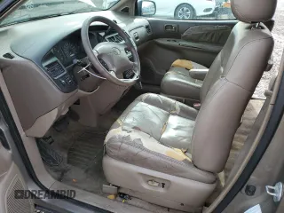 1999 Toyota Sienna LE with VIN 4T3ZF13C7XU133135, listed as a Copart auction lot 80618034 with 200,910 mi miles and Salvage Title. Bid and sale history available at carsss.com. Image 7.