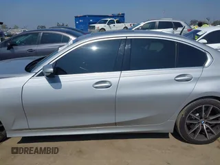 2019 BMW 3 Series 330i with VIN WBA5R1C50KAK12383, listed as a IAAI auction lot 42509330 with 78,092 mi miles and . Bid and sale history available at DreamBid. Image 14.