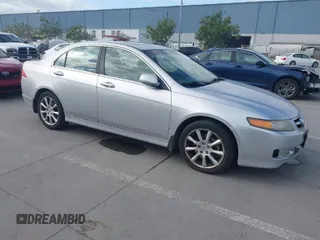 2006 Acura TSX Navi with VIN JH4CL96936C016553, listed as a IAAI auction lot 41890918 with 215,074 mi miles. Bid and sale history available at carsss.com. Image 1.