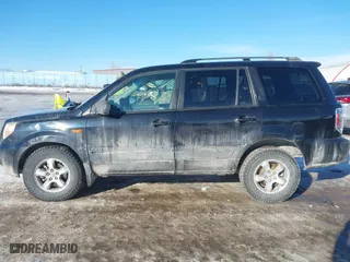 2006 Honda Pilot EX-L with VIN 2HKYF18536H526013, listed as a IAAI auction lot 41335771 with 223,265 mi miles. Bid and sale history available at carsss.com. Image 14.