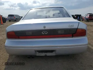 1996 Infiniti Q45 z VIN JNKNG01D1TM404004, wystawiony jako Copart lot #54433905 z przebiegiem 157 775 mil mil oraz Nie do naprawy. Historia ofert i sprzedaży dostępna na DreamBid. Obrazek 6.