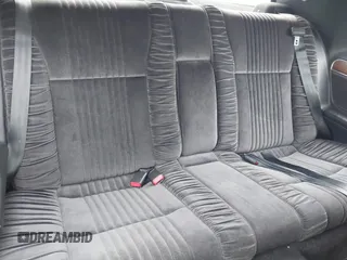1990 Mercury Cougar z VIN 1MEPM6046LH630327, wystawiony jako IAAI lot #42112236 z przebiegiem 61 933 mil mil oraz . Historia ofert i sprzedaży dostępna na DreamBid. Obrazek 8.