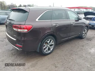 2016 Kia Sorento SX with VIN 5XYPKDA53GG082191, listed as a IAAI auction lot 41987706 with 141,397 mi miles. Bid and sale history available at carsss.com. Image 4.