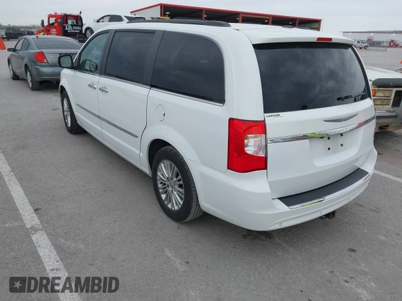 2015 Chrysler Town & Country Touring-L with VIN 2C4RC1CG9FR573863, listed as a IAAI auction lot 42036034 with 141,390 mi miles. Bid and sale history available at carsss.com. Image 3.