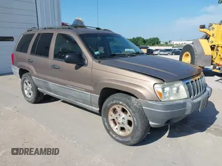 2001 Jeep Grand Cherokee Laredo with VIN 1J4GX48SX1C589592, listed as a IAAI auction lot 42826738 with 210,459 mi miles and . Bid and sale history available at DreamBid. Image 1.