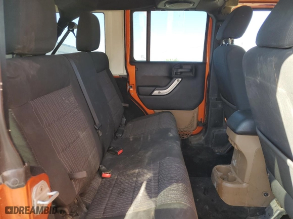 2011 Jeep Wrangler Unlimited Sahara with VIN 1J4BA5H19BL588797, listed as a Copart auction lot 72681904 with 100,763 mi miles and Salvage Title. Bid and sale history available at carsss.com. Image 11.