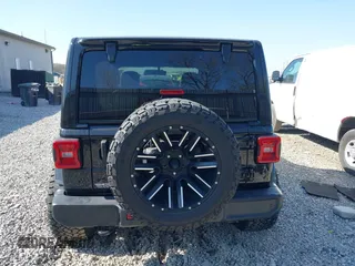 2021 Jeep Wrangler Unlimited Sahara with VIN 1C4HJXEG4MW650547, listed as a IAAI auction lot 42052146 with 26,983 mi miles and . Bid and sale history available at DreamBid. Image 17.