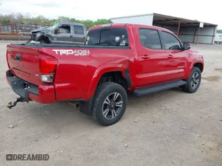 2017 Toyota Tacoma SR5 with VIN 3TMCZ5AN6HM052025, listed as a IAAI auction lot 41952748 with 140,016 mi miles. Bid and sale history available at carsss.com. Image 4.