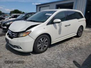 2014 Honda Odyssey Touring z VIN 5FNRL5H94EB080815, wystawiony jako Copart lot #65244325 z przebiegiem 153 314 mil mil oraz Szkoda całkowita • Salvage title. Historia ofert i sprzedaży dostępna na DreamBid. Obrazek 1.