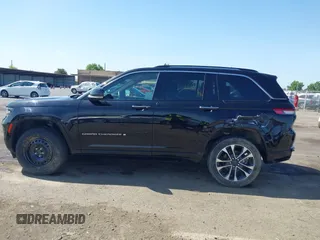 2022 Jeep Grand Cherokee Overland with VIN 1C4RJHDG1N8623744, listed as a IAAI auction lot 42554279 with 27,762 mi miles and . Bid and sale history available at DreamBid. Image 14.