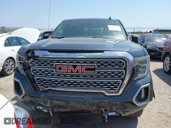 2019 GMC Sierra 1500 Denali z VIN 1GTU9FEL5KZ387012, wystawiony jako IAAI lot #42002743 z przebiegiem 124 718 mil mil oraz . Historia ofert i sprzedaży dostępna na DreamBid. Obrazek 12.