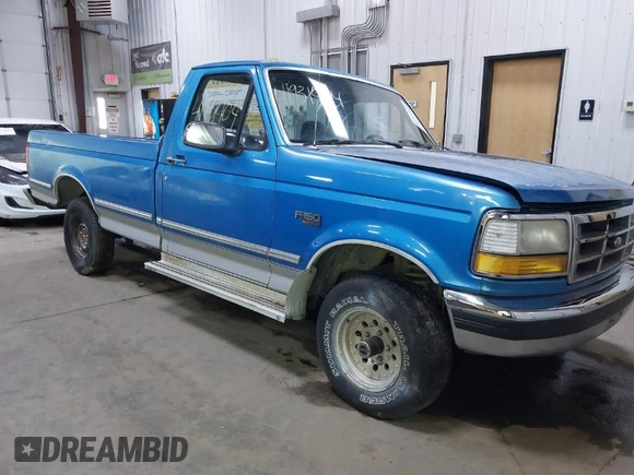1992 Ford F-150 with VIN 1FTEF14H3NP809819, listed as a IAAI auction lot 41931404 with 2,135,096 mi miles. Bid and sale history available at carsss.com. Image 1.