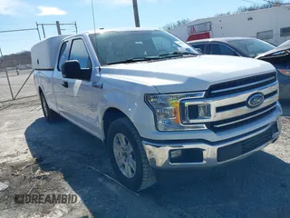 2018 Ford F-150 XL z VIN 1FTFX1C57JKF08037, wystawiony jako IAAI lot #41683537 z przebiegiem 195 633 mil mil oraz . Historia ofert i sprzedaży dostępna na DreamBid. Obrazek 1.