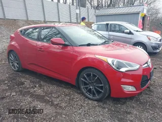 2012 Hyundai Veloster w/Black Int z VIN KMHTC6AD4CU072868, wystawiony jako IAAI lot #42029030 z przebiegiem 112 817 mil mil oraz . Historia ofert i sprzedaży dostępna na DreamBid. Obrazek 1.