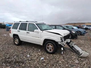 1996 Jeep Grand Cherokee Limited with VIN 1J4GZ78Y0TC185669, listed as a Copart auction lot 79032274 with 184,929 mi miles and Salvage Title. Bid and sale history available at carsss.com. Image 4.