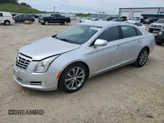 2013 Cadillac XTS Luxury z VIN 2G61P5S31D9230889, wystawiony jako Copart lot #58019135 z przebiegiem 109 265 mil mil oraz Czysty tytuł • Clean title. Historia ofert i sprzedaży dostępna na DreamBid. Obrazek 1.