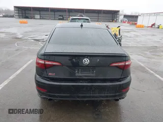 2021 Volkswagen Jetta GLI S with VIN 3VW6T7BU1MM021661, listed as a IAAI auction lot 41563793 with 124,250 mi miles and . Bid and sale history available at DreamBid. Image 16.