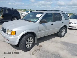 1998 Honda Passport LX z VIN 4S6CM58WXW4414530, wystawiony jako IAAI lot #42060405 z przebiegiem 175 406 mil mil oraz . Historia ofert i sprzedaży dostępna na DreamBid. Obrazek 2.