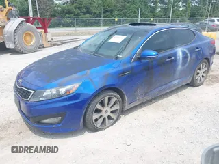 2013 Kia Optima SX with VIN 5XXGR4A68DG122057, listed as a IAAI auction lot 42421160 with 219,965 mi miles and . Bid and sale history available at DreamBid. Image 2.