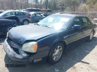 2002 Cadillac DeVille DTS with VIN 1G6KF57912U205527, listed as a IAAI auction lot 42064174 with 135,002 mi miles. Bid and sale history available at carsss.com. Image 2.
