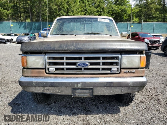 1987 Ford F-150 с VIN 1FTEF14H2HKB06296, выставлен на аукционе Copart как лот 57914035 с пробегом 40 931 миль миль и Чистый • Clean title. История ставок и продаж доступна на DreamBid. Изображение 5.
